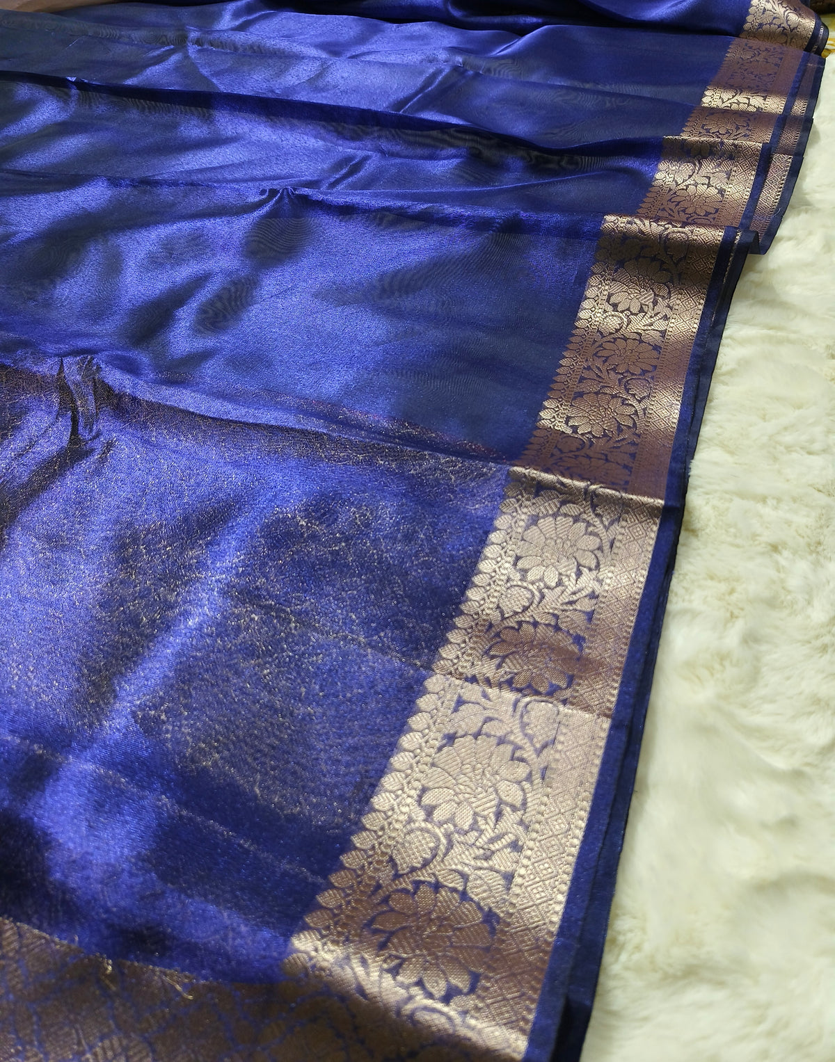 Dual-Tone Royal Sapphire Tissue Saree with Floral Zari Border 3. Shopify Product Description