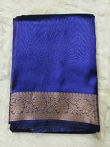 Dual-Tone Royal Sapphire Tissue Saree with Floral Zari Border 3. Shopify Product Description